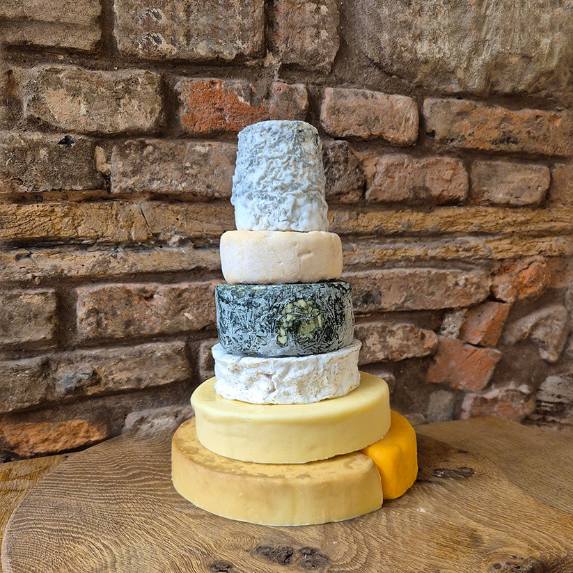 Ronnie cheese cake with extra base 2.45kg, 7 cheeses stacked up into a cheese party cake