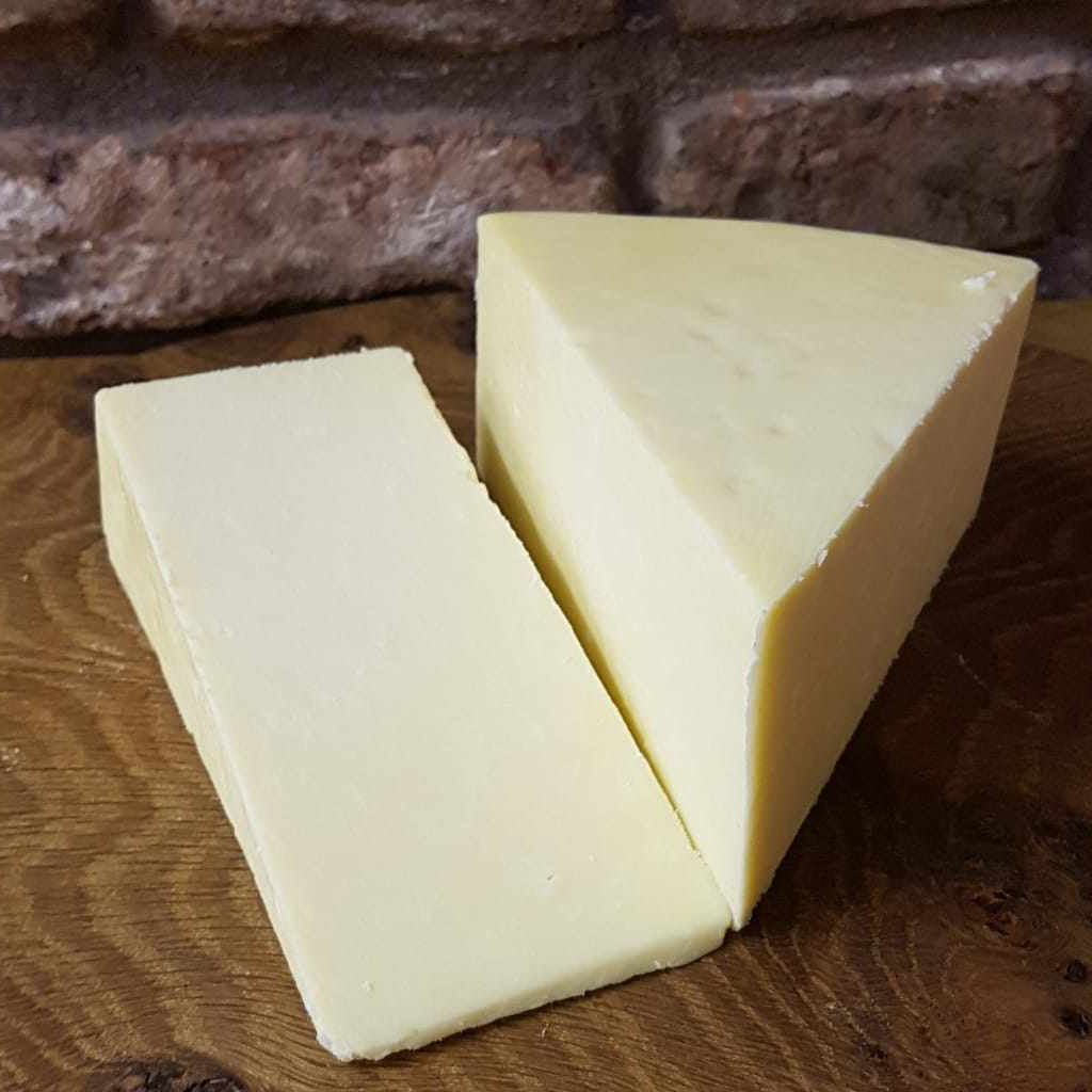 Wensleydale Cheese (Hawes) , traditional crumbly British cheese